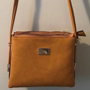 Mustard yellow tri-pocket zip close crossbody purse
